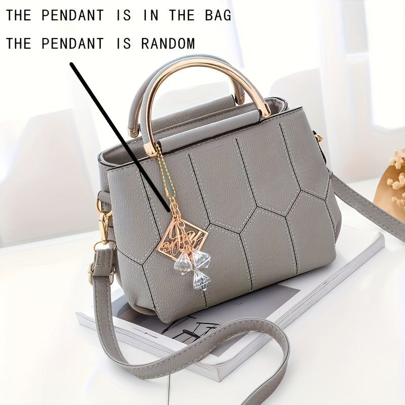 A Stylish Crossbody Bag for Women, Perfect for Everyday Needs, Featuring a Stitched Design, a Golden Chain, And a Decorative Stone.