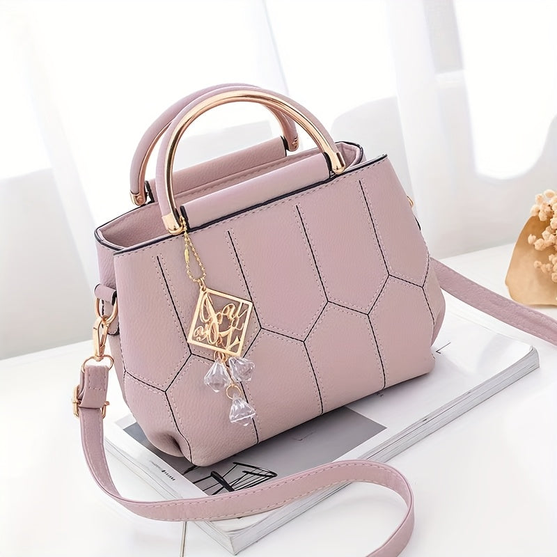 A Stylish Crossbody Bag for Women, Perfect for Everyday Needs, Featuring a Stitched Design, a Golden Chain, And a Decorative Stone.