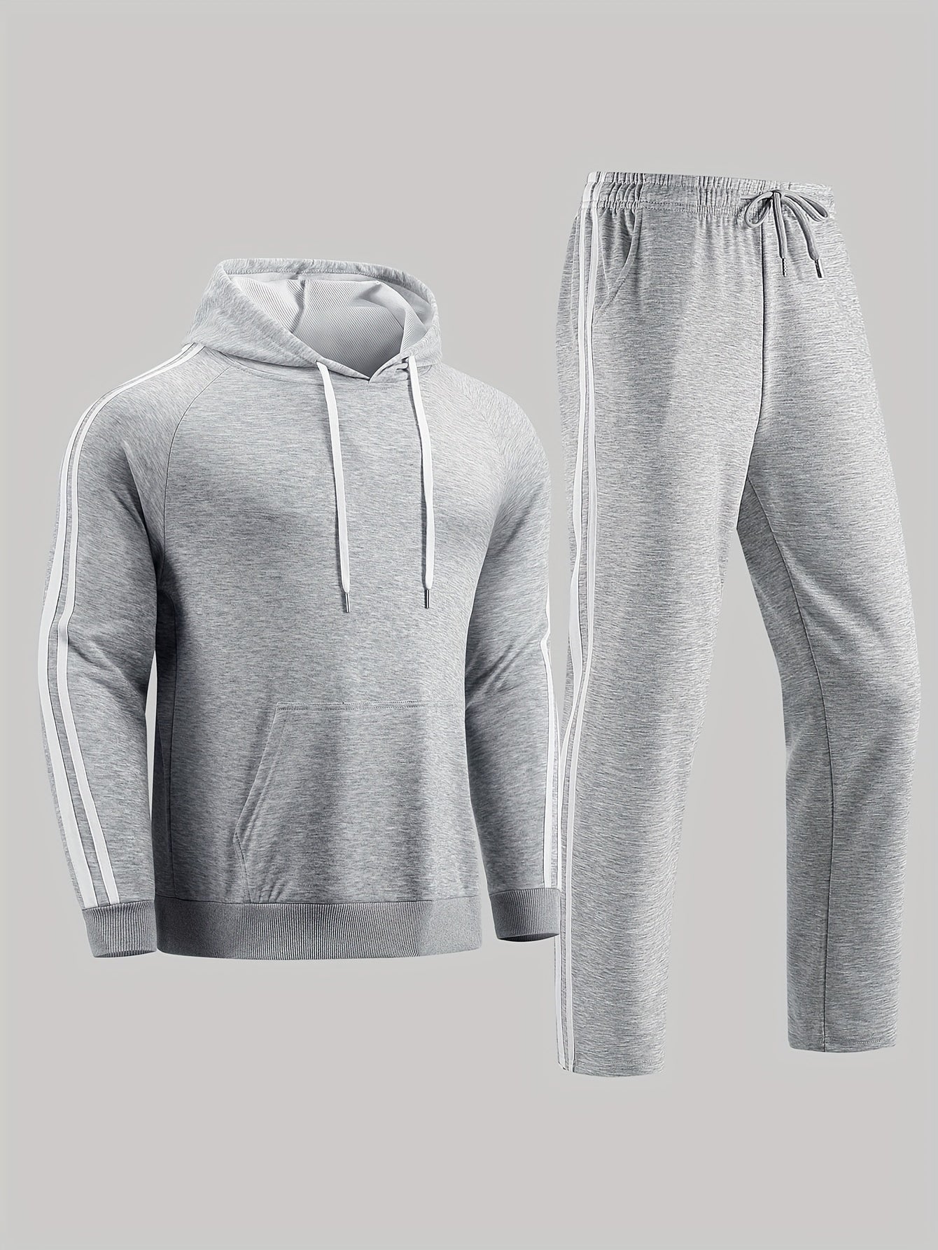 A Set of Two Men'S Casual Sports Outfits, Featuring a Striped Design with Moderately Soft Fabric, Suitable for Outdoor Running And Fitness Activities in All Seasons.