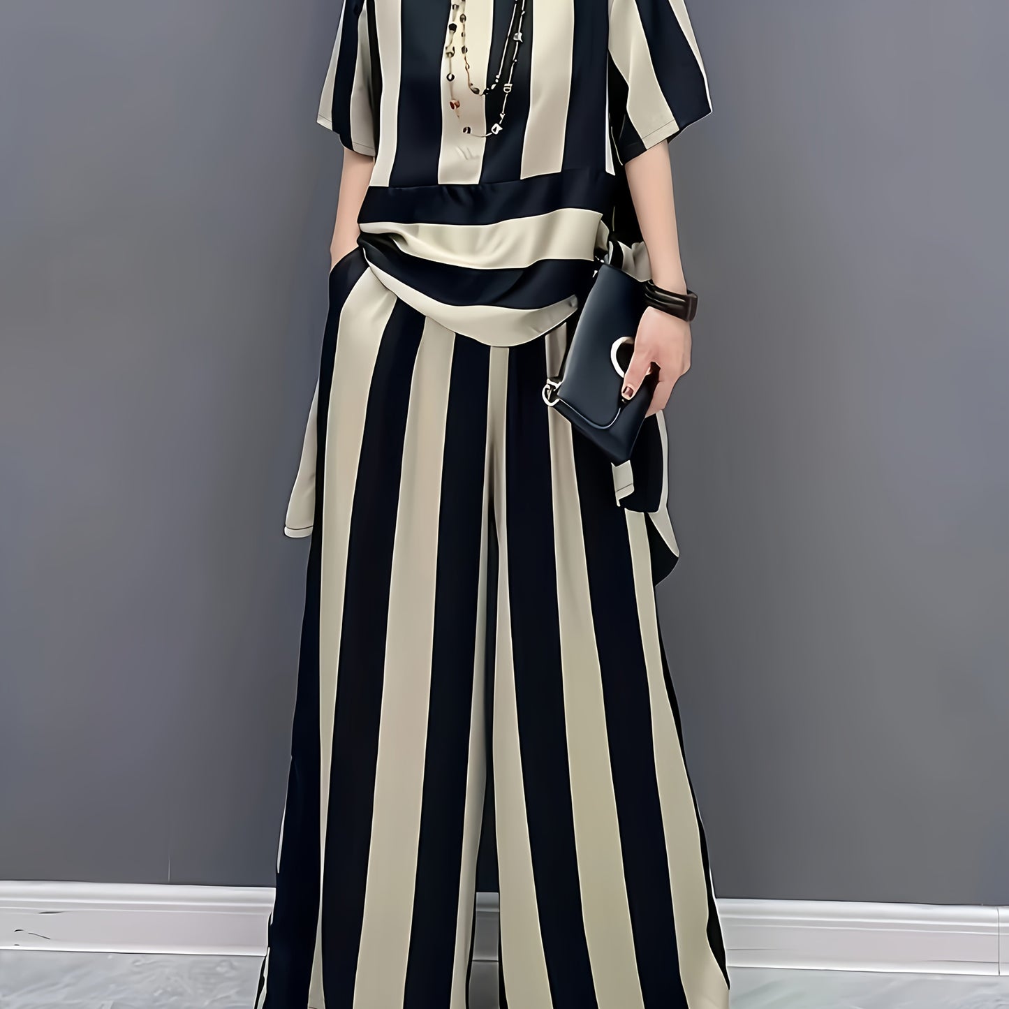 Artistic Irregular Stripe Loose Round Neck Pullover Top with Flared Pants Women's Set