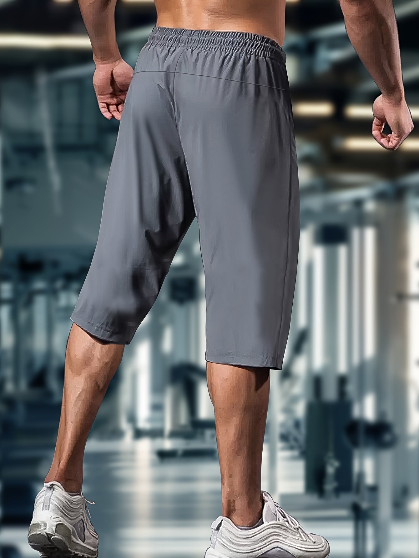 Men'S Summer Capri Pants Made from Highly Elastic Fabric, Featuring a Stylish Drawstring Elastic Waistband And Zip Pockets, Suitable for Casual Sports, Outdoor Activities, And Everyday Wear.