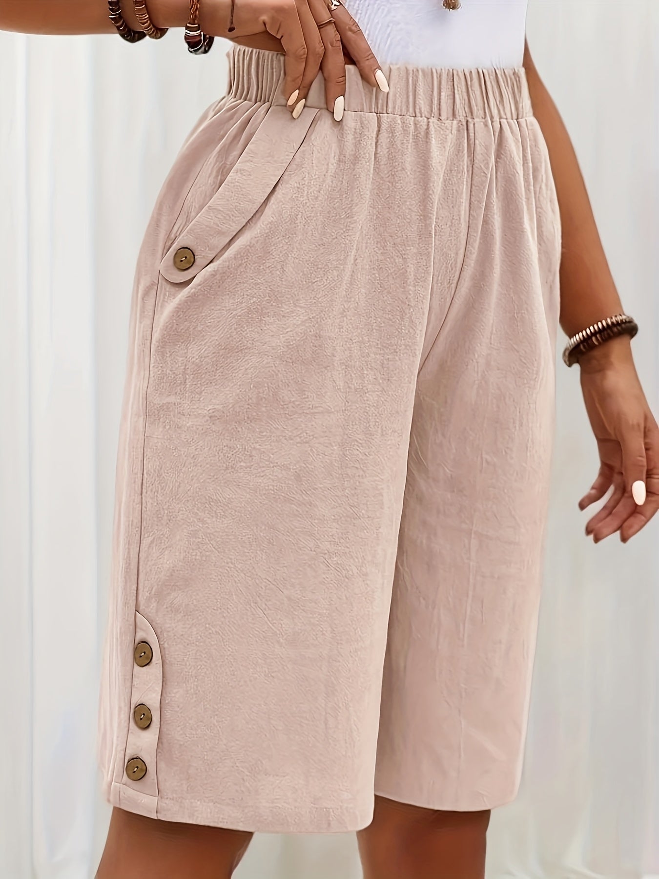 Lightweight Design | Elegant Button-Accent Elastic Waist Shorts for Women - Versatile Loose Fit, Solid Beige Color, Blend with Pockets, Perfect for Summer Casual Wear