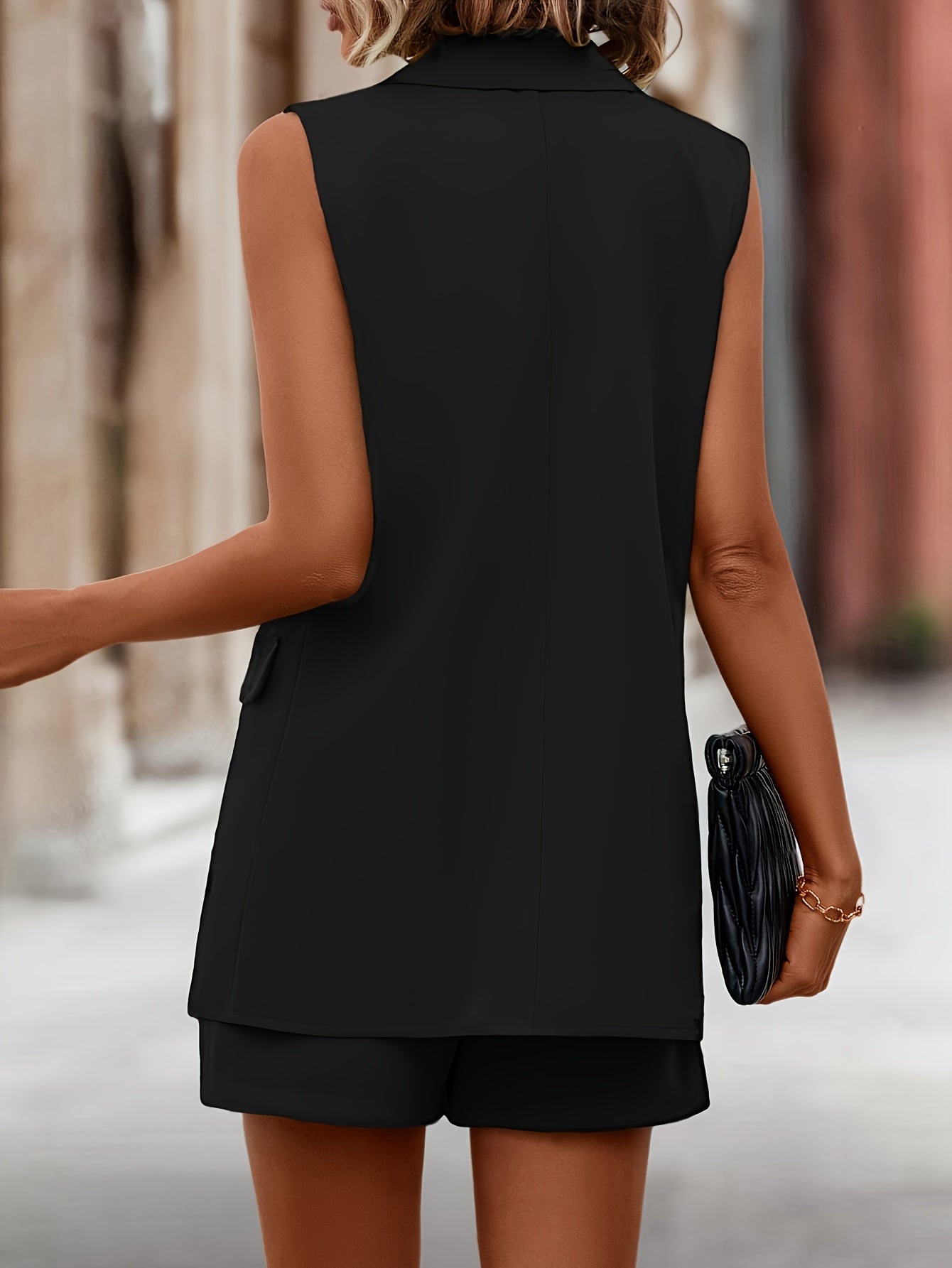 A Suit Jacket with a Single-Button Design Paired with Shorts.