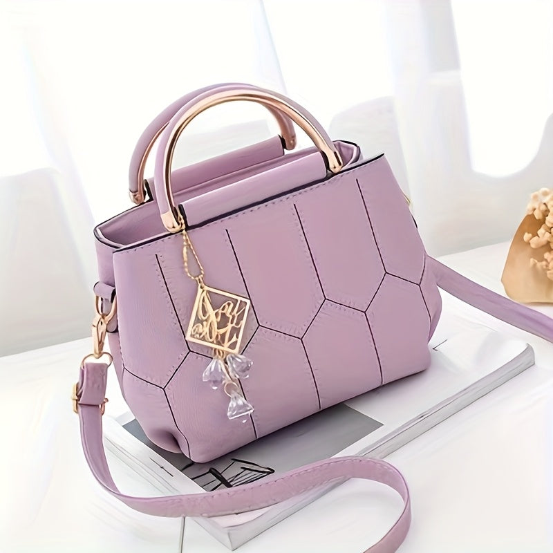 A Stylish Crossbody Bag for Women, Perfect for Everyday Needs, Featuring a Stitched Design, a Golden Chain, And a Decorative Stone.