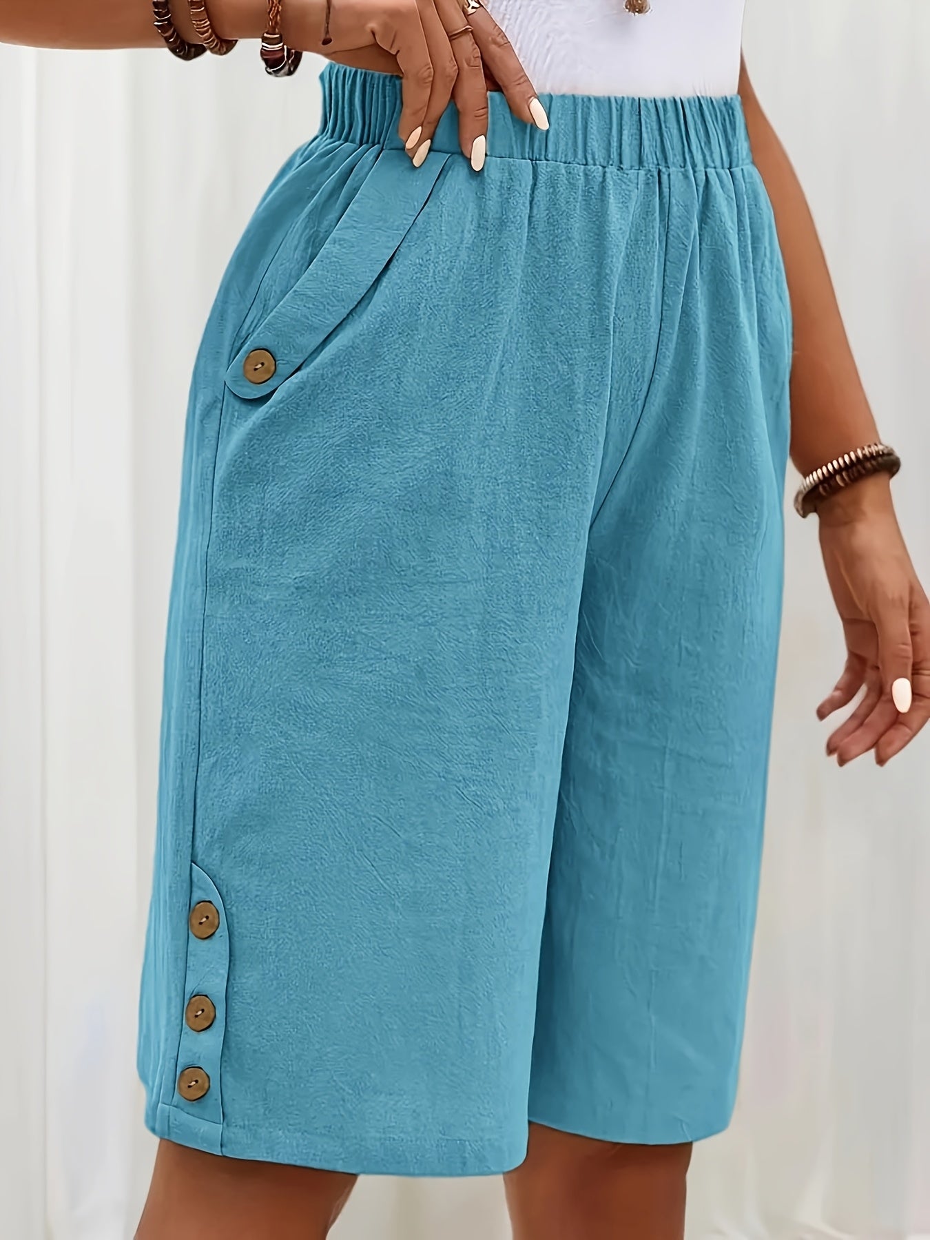 Lightweight Design | Elegant Button-Accent Elastic Waist Shorts for Women - Versatile Loose Fit, Solid Beige Color, Blend with Pockets, Perfect for Summer Casual Wear