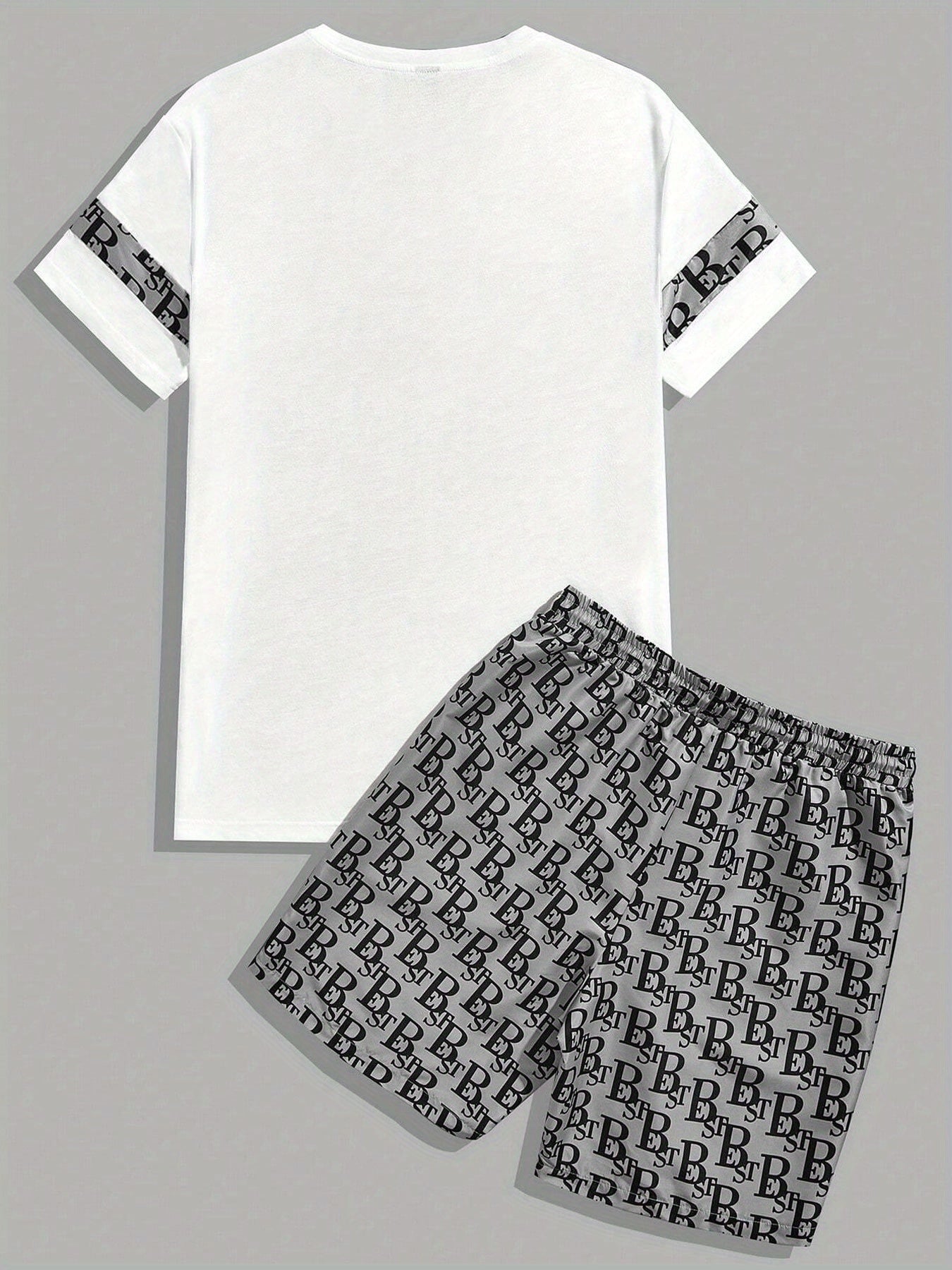 A fashionable letter print design T-shirt set, featuring a combination of round neck, short sleeves and shorts, is casual, simple, comfortable and soft. It is a two-piece set for Men's summer daily casual wear