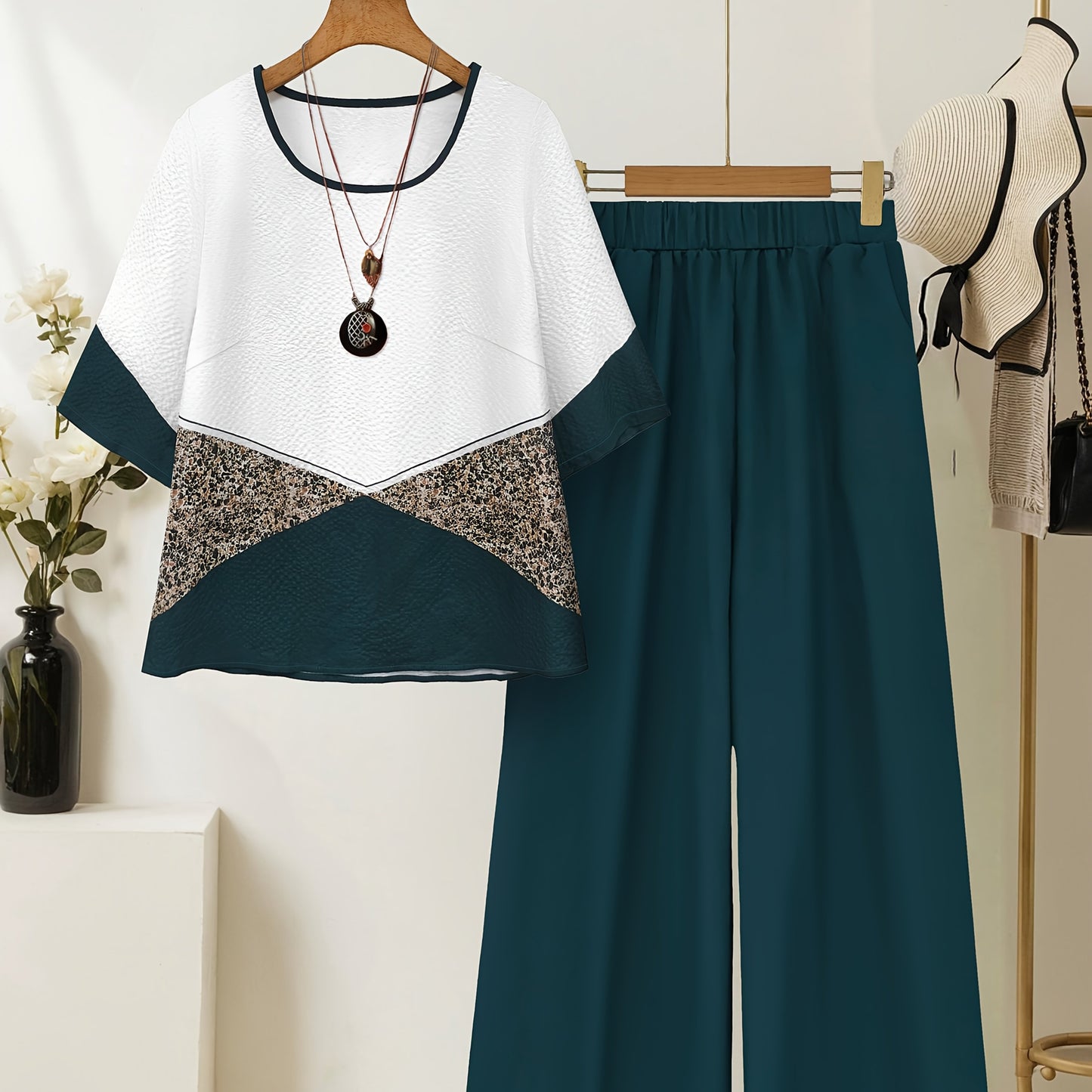 Women's fashionable printed patchwork round-neck top with solid-colored wide-leg trousers