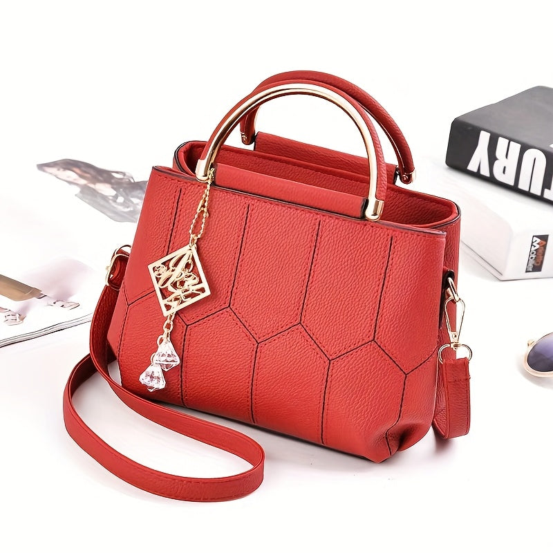 A Stylish Crossbody Bag for Women, Perfect for Everyday Needs, Featuring a Stitched Design, a Golden Chain, And a Decorative Stone.