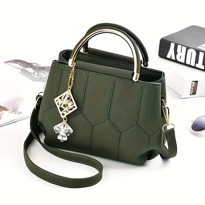 A Stylish Crossbody Bag for Women, Perfect for Everyday Needs, Featuring a Stitched Design, a Golden Chain, And a Decorative Stone.