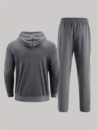 A Set of Two Men'S Casual Sports Outfits, Featuring a Striped Design with Moderately Soft Fabric, Suitable for Outdoor Running And Fitness Activities in All Seasons.