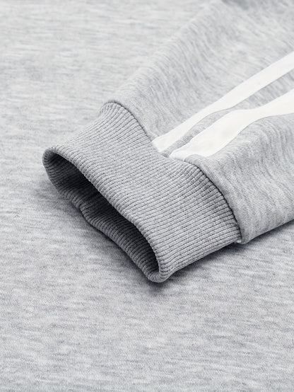 A Set of Two Men'S Casual Sports Outfits, Featuring a Striped Design with Moderately Soft Fabric, Suitable for Outdoor Running And Fitness Activities in All Seasons.