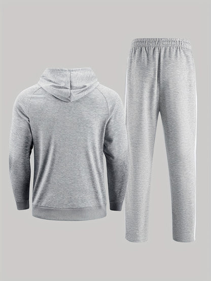 A Set of Two Men'S Casual Sports Outfits, Featuring a Striped Design with Moderately Soft Fabric, Suitable for Outdoor Running And Fitness Activities in All Seasons.