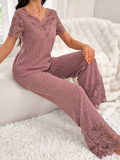A Two-Piece Set Featuring a Solid Color Short-Sleeve Top with Lace Patchwork And Matching Long Pants.