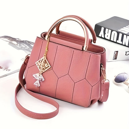 A Stylish Crossbody Bag for Women, Perfect for Everyday Needs, Featuring a Stitched Design, a Golden Chain, And a Decorative Stone.