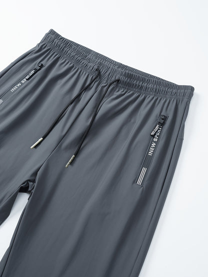 Men's sports trousers that absorb moisture and sweat, keep you dry and breathable, with pockets and drawstrings, zipper details, soft and comfortable soft-touch Men's jogging pants, lightweight and durable sports trousers, cl