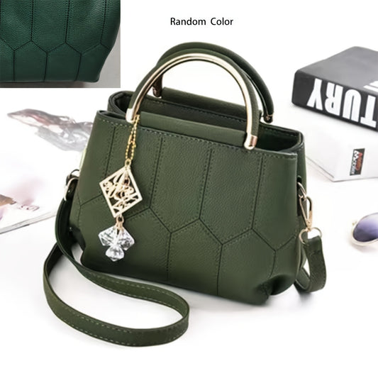 A Stylish Crossbody Bag for Women, Perfect for Everyday Needs, Featuring a Stitched Design, a Golden Chain, And a Decorative Stone.