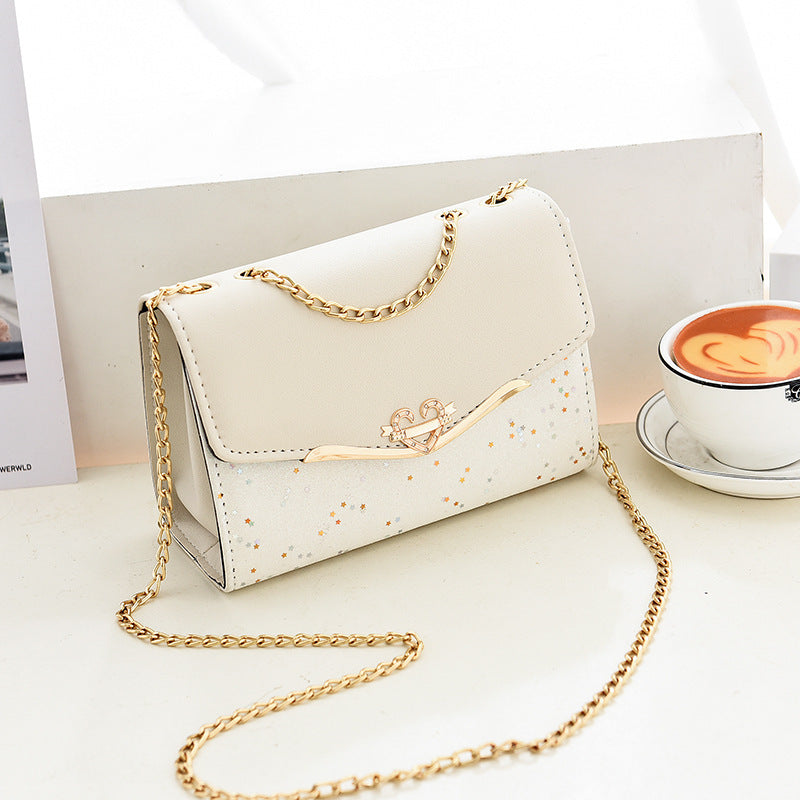 Fashionable New Women'S Shoulder Bag. This One Is a Crossbody Bag with Six Color Options to Choose From. It Is Fashionable Bohemian Beige PU Crossbody Bag with Tassel Charm - City Style Flip-Top Shoulder Bag with Metal Chain