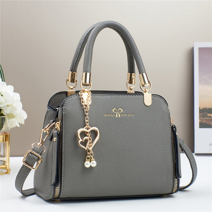 A Stylish And Versatile Women'S Bag with a Large Capacity, Featuring a Minimalist Trendy Design And a Textured Lychee Pattern, Suitable for Shoulder, Crossbody, Or Hand Carry.