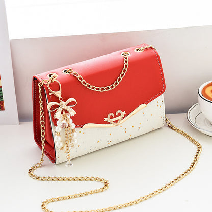 Fashionable New Women'S Shoulder Bag. This One Is a Crossbody Bag with Six Color Options to Choose From. It Is Fashionable Bohemian Beige PU Crossbody Bag with Tassel Charm - City Style Flip-Top Shoulder Bag with Metal Chain
