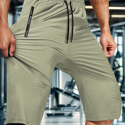 Men'S Summer Capri Pants Made from Highly Elastic Fabric, Featuring a Stylish Drawstring Elastic Waistband And Zip Pockets, Suitable for Casual Sports, Outdoor Activities, And Everyday Wear.