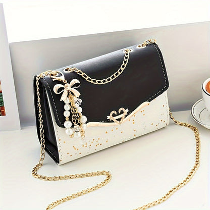 A Festive Mini Shoulder Bag with Shiny Details - Made of PU Material, Lightweight, Featuring an Adjustable Strap And Magnetic Closure, Perfect for Gifting to Family And Friends During The Holidays.