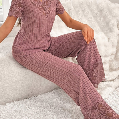 A Two-Piece Set Featuring a Solid Color Short-Sleeve Top with Lace Patchwork And Matching Long Pants.