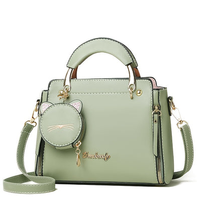 Visually Appealing Light Green Handbag with Adjustable Strap & Cat Charm – Versatile Shoulder Bag for Travel, Shopping, and Gifting, Travel Handbag | Minimalist Design | Polyester Lining, Crossbody Purse