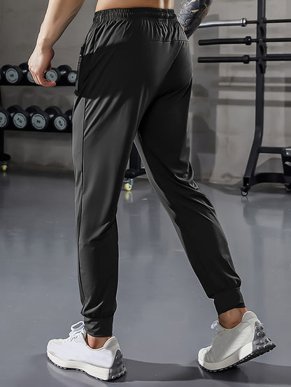 Men'S Athletic Stretch Pants with Adjustable Drawstring Waist, Featuring Zippered Pockets And Solid Color, Quick-Dry Joggers, Perfect for Fitness And Running Workouts.