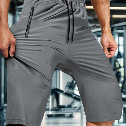 Men'S Summer Capri Pants Made from Highly Elastic Fabric, Featuring a Stylish Drawstring Elastic Waistband And Zip Pockets, Suitable for Casual Sports, Outdoor Activities, And Everyday Wear.