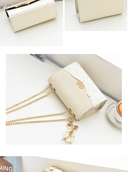 Fashionable New Women'S Shoulder Bag. This One Is a Crossbody Bag with Six Color Options to Choose From. It Is Fashionable Bohemian Beige PU Crossbody Bag with Tassel Charm - City Style Flip-Top Shoulder Bag with Metal Chain