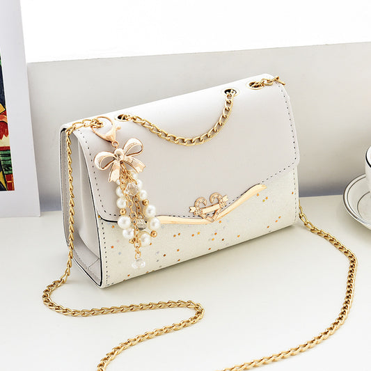 Fashionable New Women'S Shoulder Bag. This One Is a Crossbody Bag with Six Color Options to Choose From. It Is Fashionable Bohemian Beige PU Crossbody Bag with Tassel Charm - City Style Flip-Top Shoulder Bag with Metal Chain