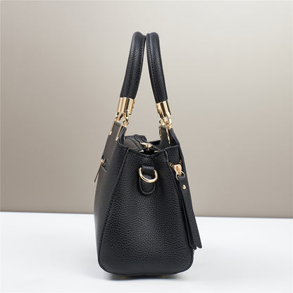 A Stylish And Versatile Women'S Bag with a Large Capacity, Featuring a Minimalist Trendy Design And a Textured Lychee Pattern, Suitable for Shoulder, Crossbody, Or Hand Carry.