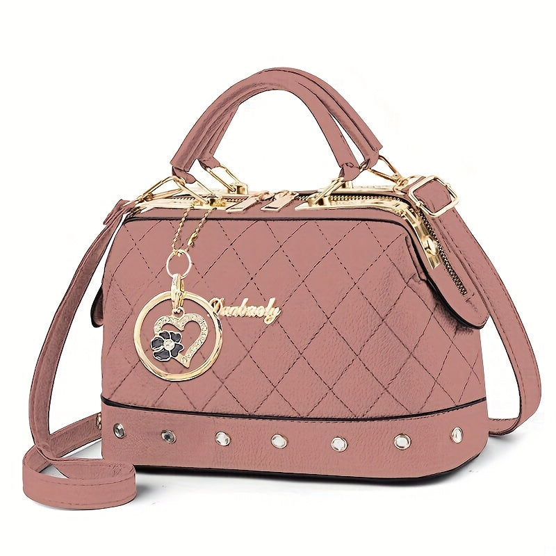 Black Quilted Boston Bag with Golden-Tone Hardware & Adjustable Strap - Elegant Heart Rhinestone Charm, Pattern, and Stylish Stud Details for Wo