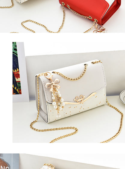 Fashionable New Women'S Shoulder Bag. This One Is a Crossbody Bag with Six Color Options to Choose From. It Is Fashionable Bohemian Beige PU Crossbody Bag with Tassel Charm - City Style Flip-Top Shoulder Bag with Metal Chain