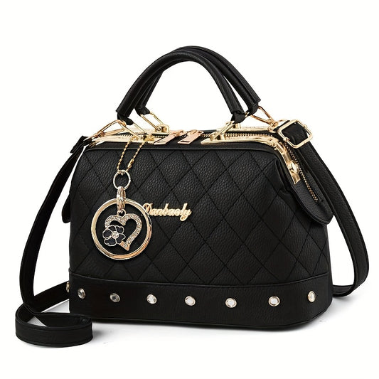 Black Quilted Boston Bag with Golden-Tone Hardware & Adjustable Strap - Elegant Heart Rhinestone Charm, Pattern, and Stylish Stud Details for Wo