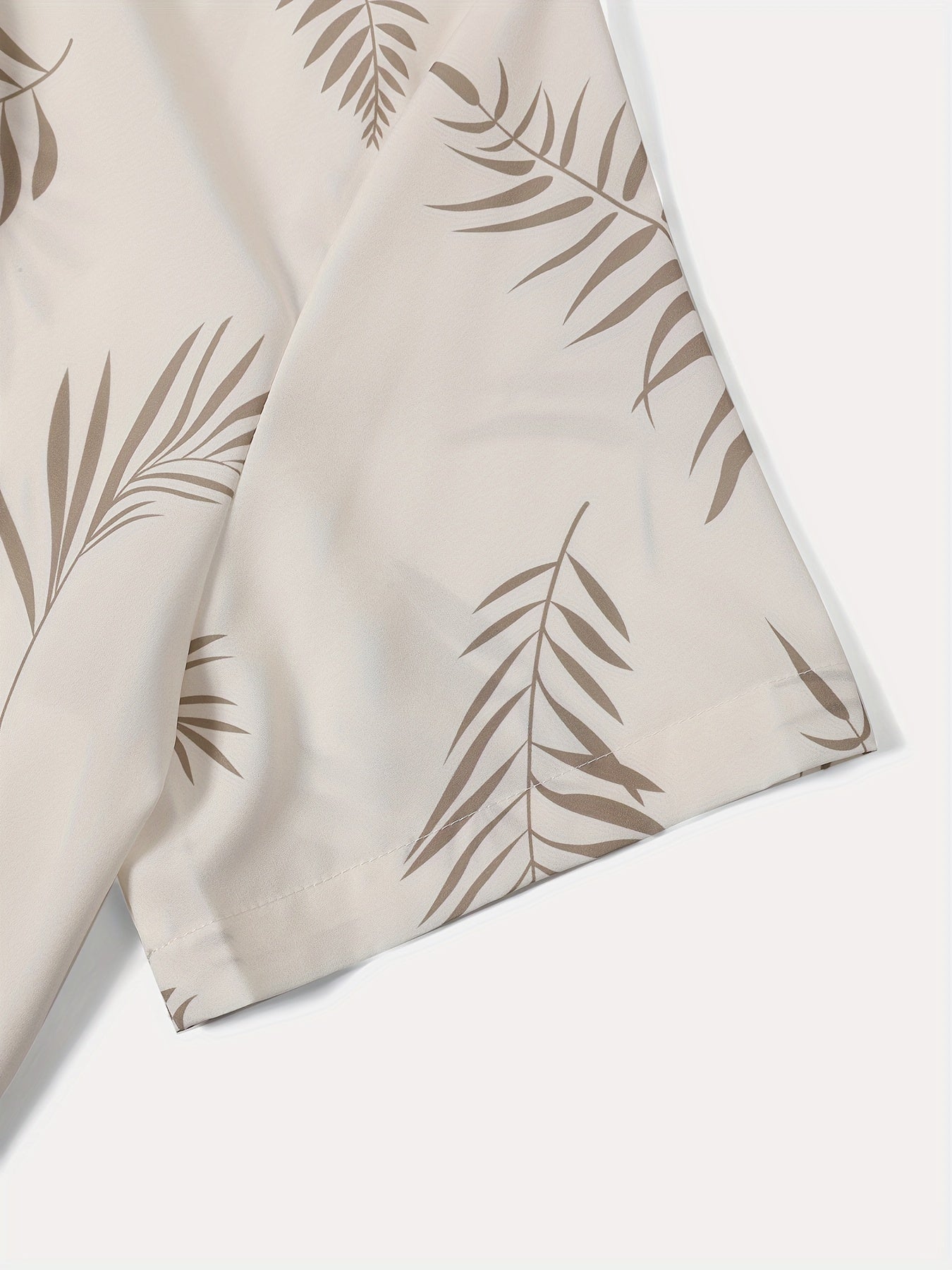 2-piece Men's Holiday Style Summer Outfit Set, Leafs Pattern Print Short Sleeve Button Up Lapel Shirt Top & Solid Drawstring Shorts With Pockets