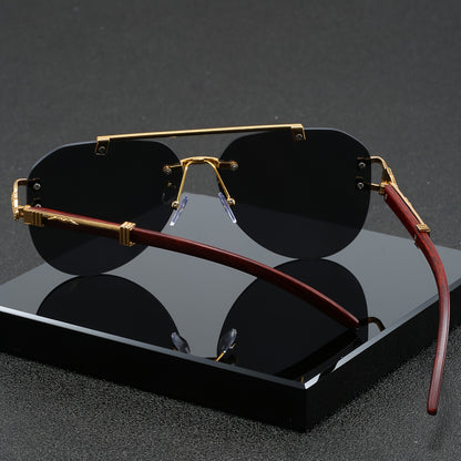 A Pair of Men'S Golden Double-Bridge Frameless Oval Glasses with Leopard Decoration And Faux Wood Grain, Stylish Unisex Eyewear.
