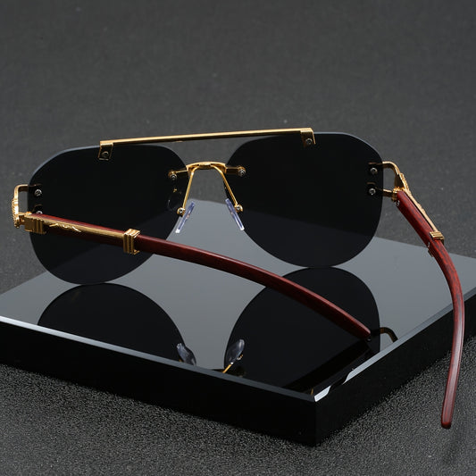 A Pair of Men'S Golden Double-Bridge Frameless Oval Glasses with Leopard Decoration And Faux Wood Grain, Stylish Unisex Eyewear.