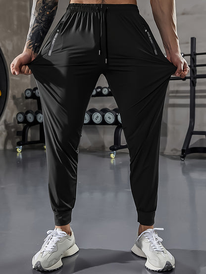 Men'S Athletic Stretch Pants with Adjustable Drawstring Waist, Featuring Zippered Pockets And Solid Color, Quick-Dry Joggers, Perfect for Fitness And Running Workouts.