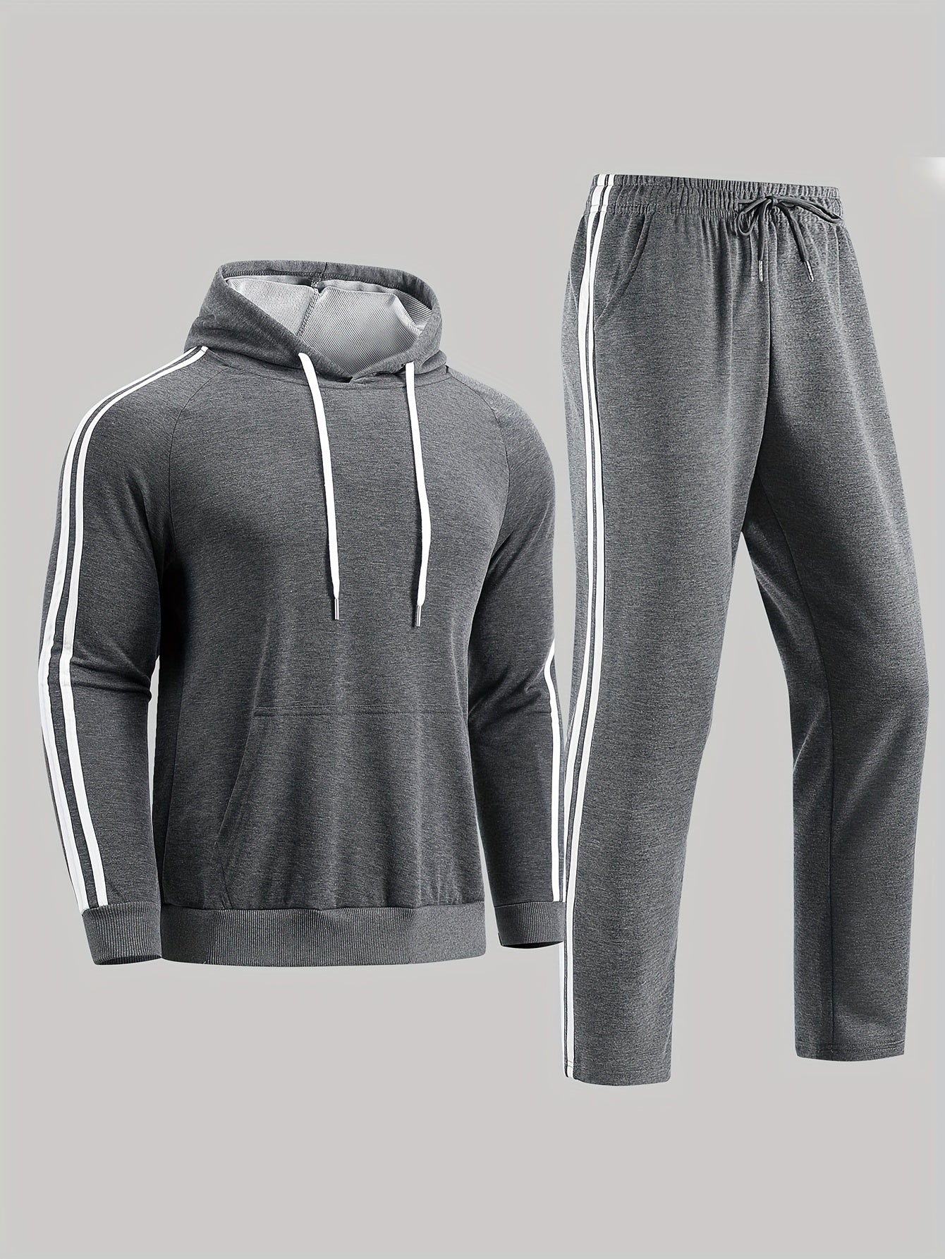 A Set of Two Men'S Casual Sports Outfits, Featuring a Striped Design with Moderately Soft Fabric, Suitable for Outdoor Running And Fitness Activities in All Seasons.