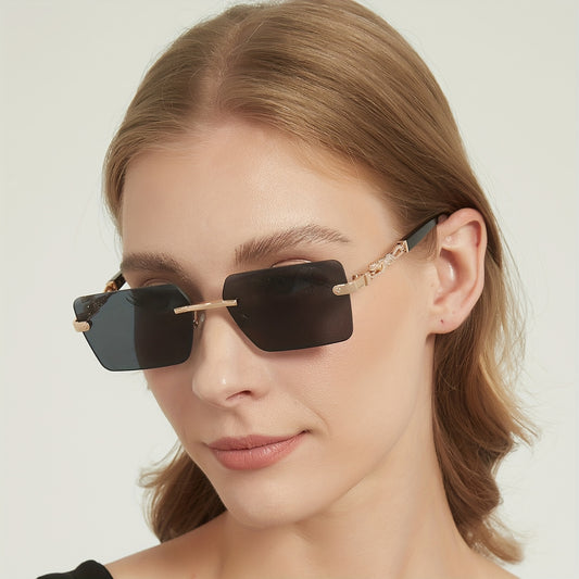 A pair of fashionable glasses with a retro style, featuring rimless leopard print temples and a compact trendy frame
