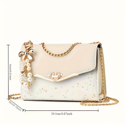 A Festive Mini Shoulder Bag with Shiny Details - Made of PU Material, Lightweight, Featuring an Adjustable Strap And Magnetic Closure, Perfect for Gifting to Family And Friends During The Holidays.