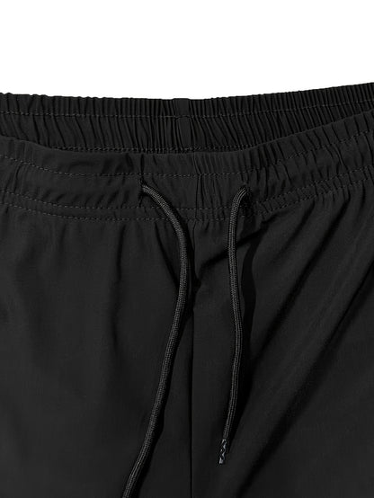 Men'S Summer Capri Pants Made from Highly Elastic Fabric, Featuring a Stylish Drawstring Elastic Waistband And Zip Pockets, Suitable for Casual Sports, Outdoor Activities, And Everyday Wear.
