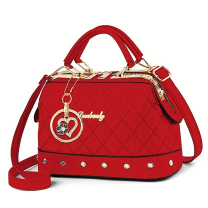 Black Quilted Boston Bag with Golden-Tone Hardware & Adjustable Strap - Elegant Heart Rhinestone Charm, Pattern, and Stylish Stud Details for Wo