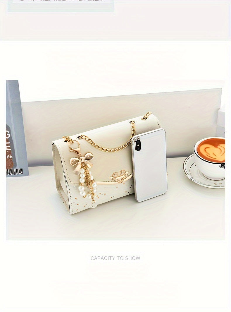A Festive Mini Shoulder Bag with Shiny Details - Made of PU Material, Lightweight, Featuring an Adjustable Strap And Magnetic Closure, Perfect for Gifting to Family And Friends During The Holidays.