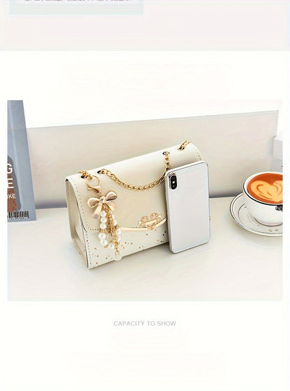 A Festive Mini Shoulder Bag with Shiny Details - Made of PU Material, Lightweight, Featuring an Adjustable Strap And Magnetic Closure, Perfect for Gifting to Family And Friends During The Holidays.
